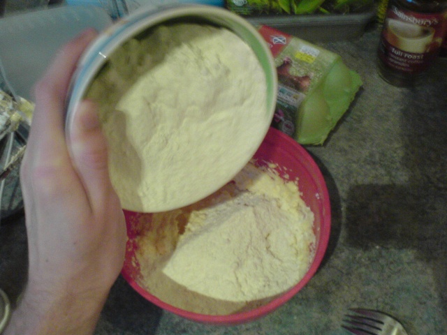 Adding flour to mix